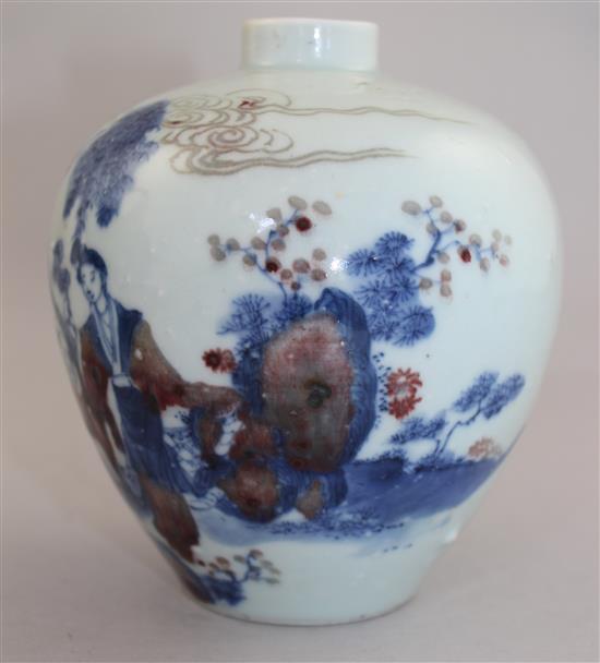 A Chinese underglaze blue and copper red small ovoid vase, Kangxi six character mark, early 20th century, 12cm